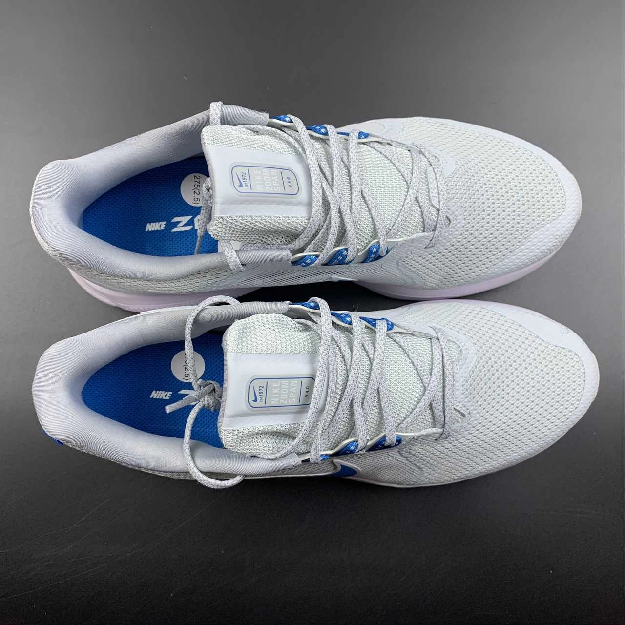 Outsole ridges enhance surface contact and grip Zoom Span 4 Pure Platinum Imperial Blue DC8996-010