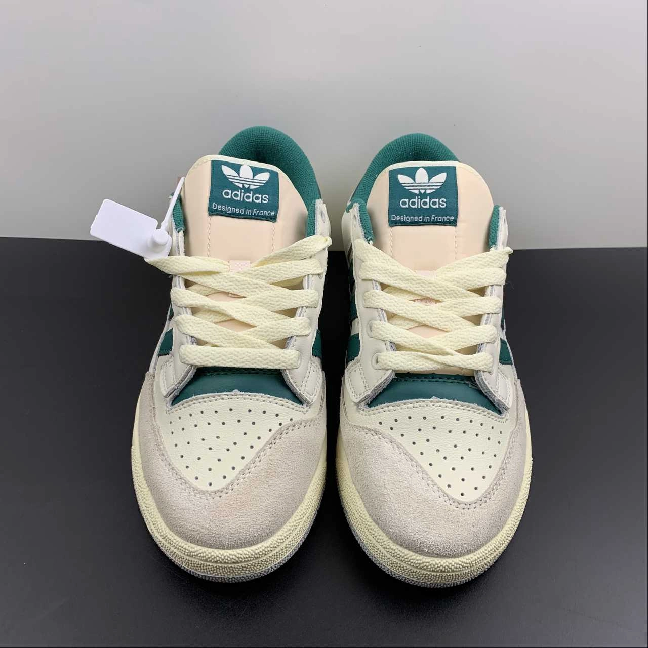 Adidas Centennial 85 Low Cloud White Green GX2214 running with a gum rubber outsole Mud - Resistant