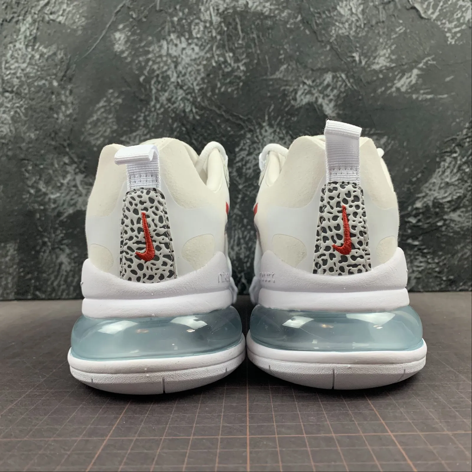 fashion - forward shoe intention Air Max 270 React Neutral Grey University Red CT2535-001