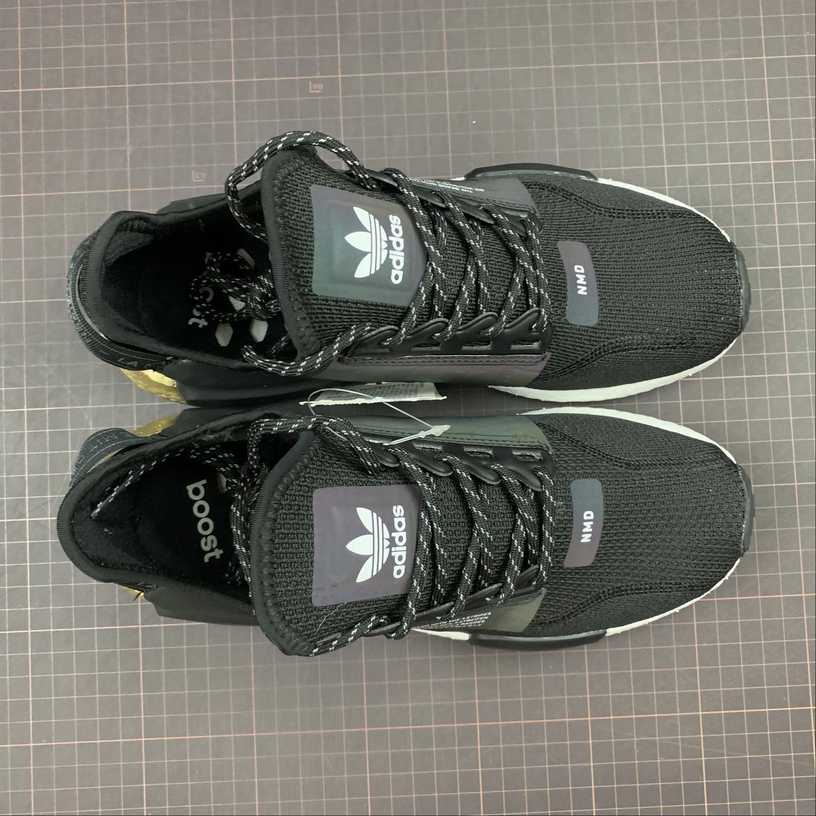 Adidas NMD R1 V2 Black Gold and White EnergyReturn vented shoes