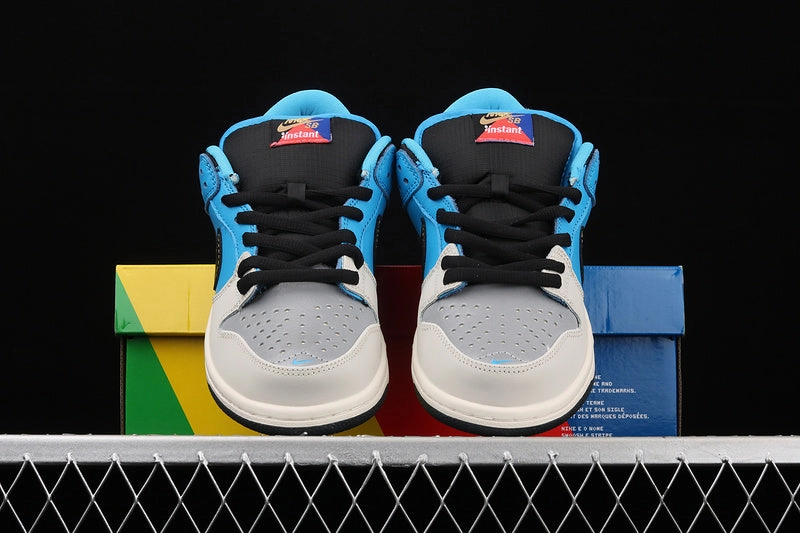 Compression Molded Outsole Instant Skateboards x SB Dunk Low Blue Hero Pale Ivory Black CZ5128-400