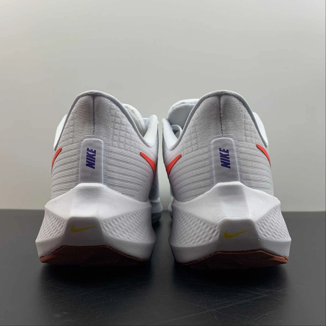 Integrated foam pod enhances lift support High Energy Air Zoom Pegasus 39 Football Grey Bright Crinsom DH4071-007