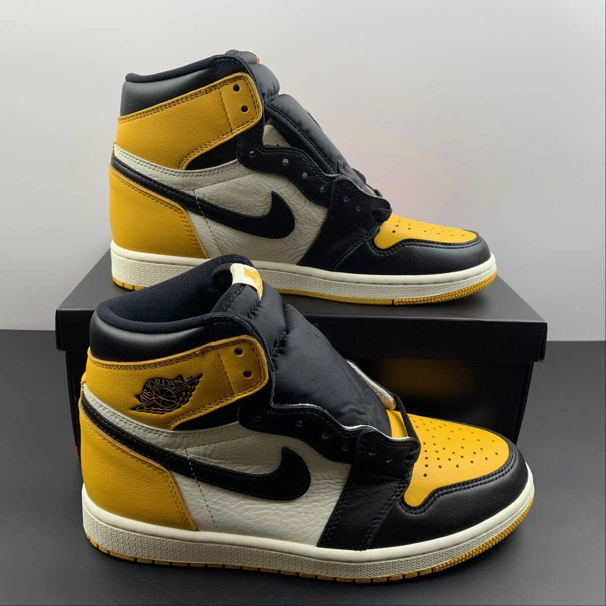Air Jordan 1 Retro High OG Taxi Black-Sail Minimalist Design