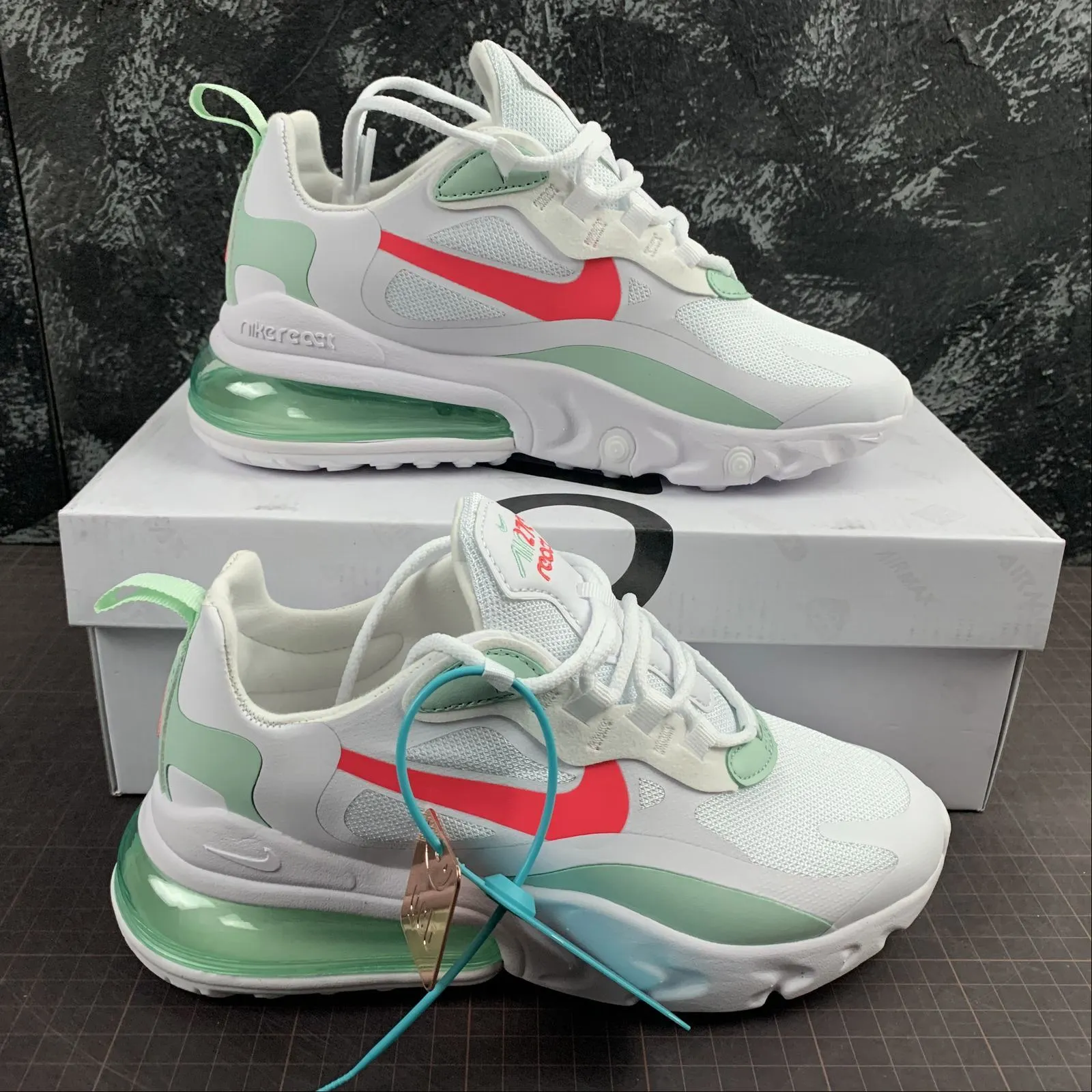 Air Max 270 React White Laser Deep Red CV3025-100 running on uphill shoes