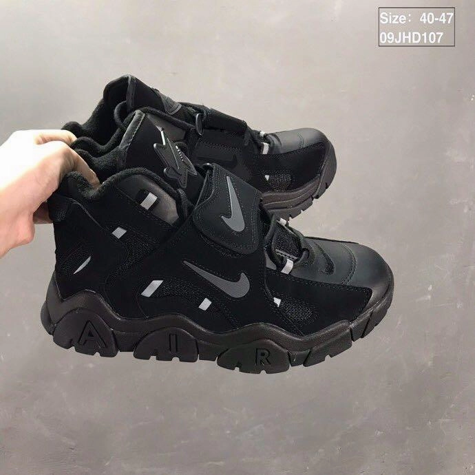 running in a tram station area shoes Air Barrage Mid QS Black Full AT7847-002