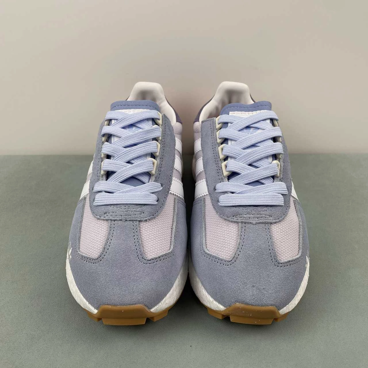 running on a treadmill at the gym shoes frequent use Adidas Retropy E5 Purple White Pink IF6808