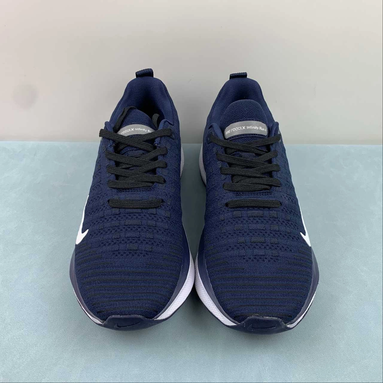 Nike ReactX Infinity Run 4 College Navy Black Sail Platinum Tint DR2665-400 running in a river area shoes Toe Comfort