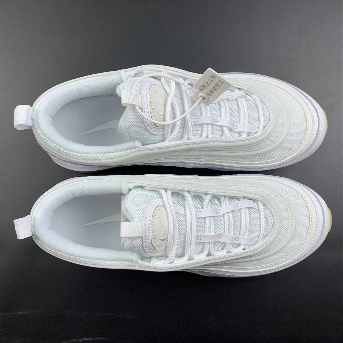 running in a ferry terminal area shoes Air Max 97 White Light Gum Brown Blue DJ2740-100