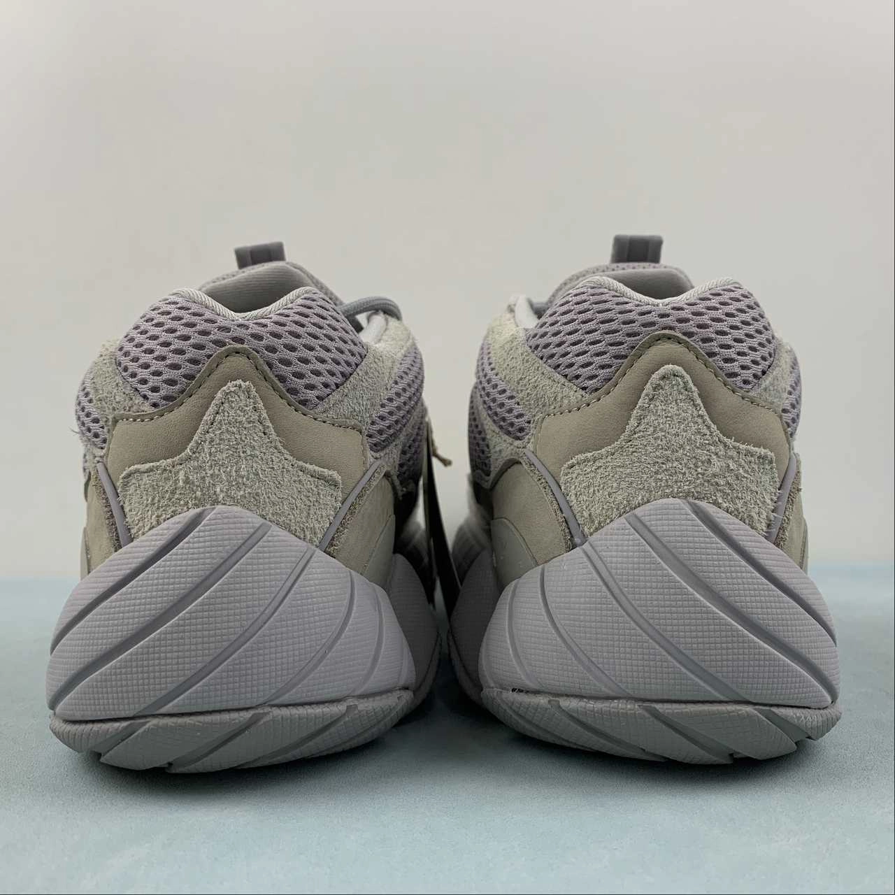 Adidas Yeezy 500 Gray Cream IE4783 running in a desert oasis area shoes