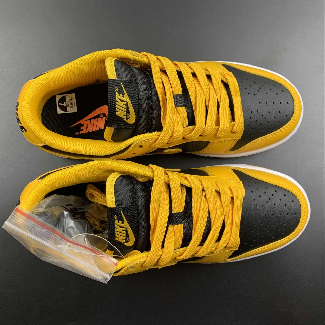 SB Dunk Low Championship Goldenrod Black White DD1391-004 Foot Motion