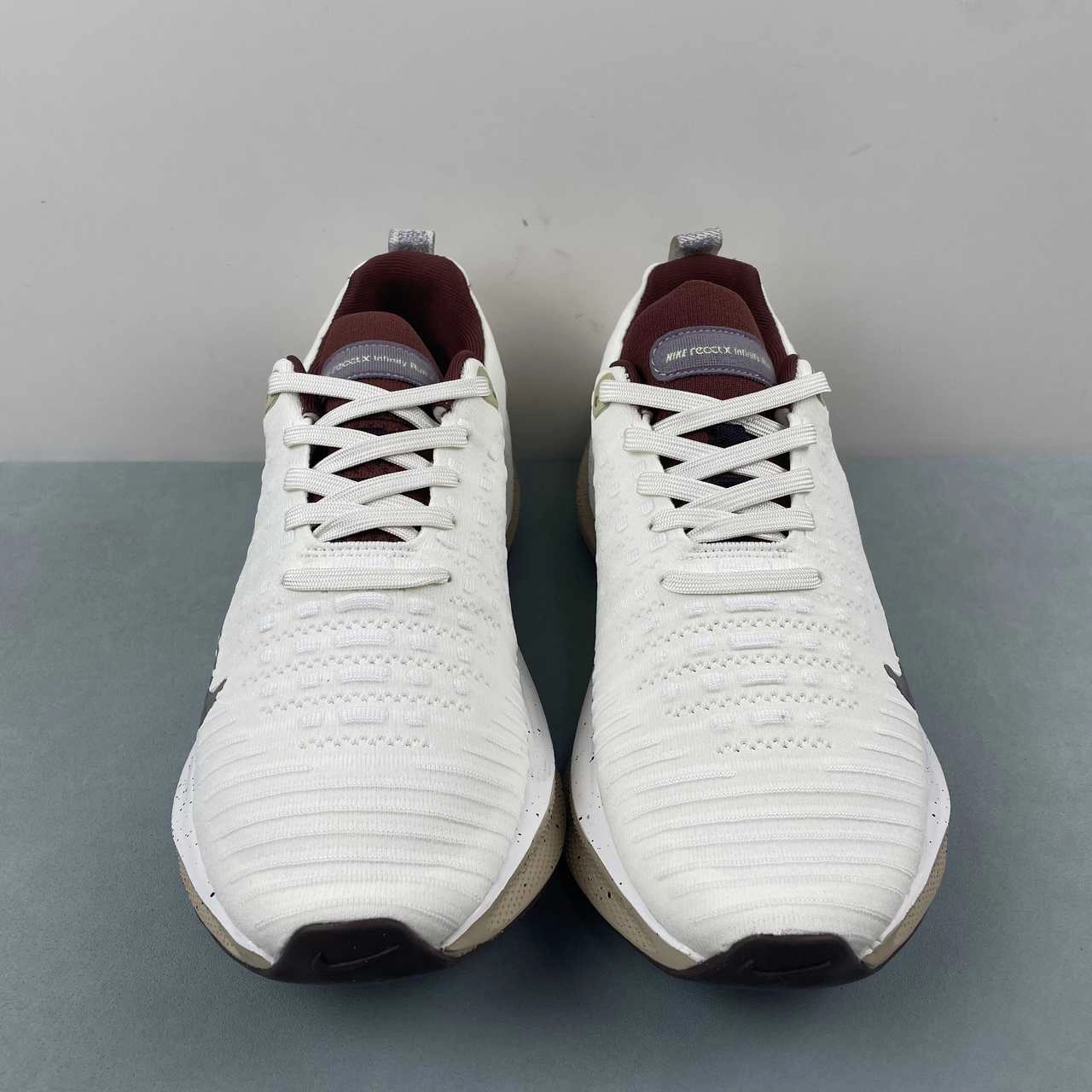 Nike ReactX Infinity Run 4 Sail Gray Red Tan HF5710-101 running in old tracks shoes