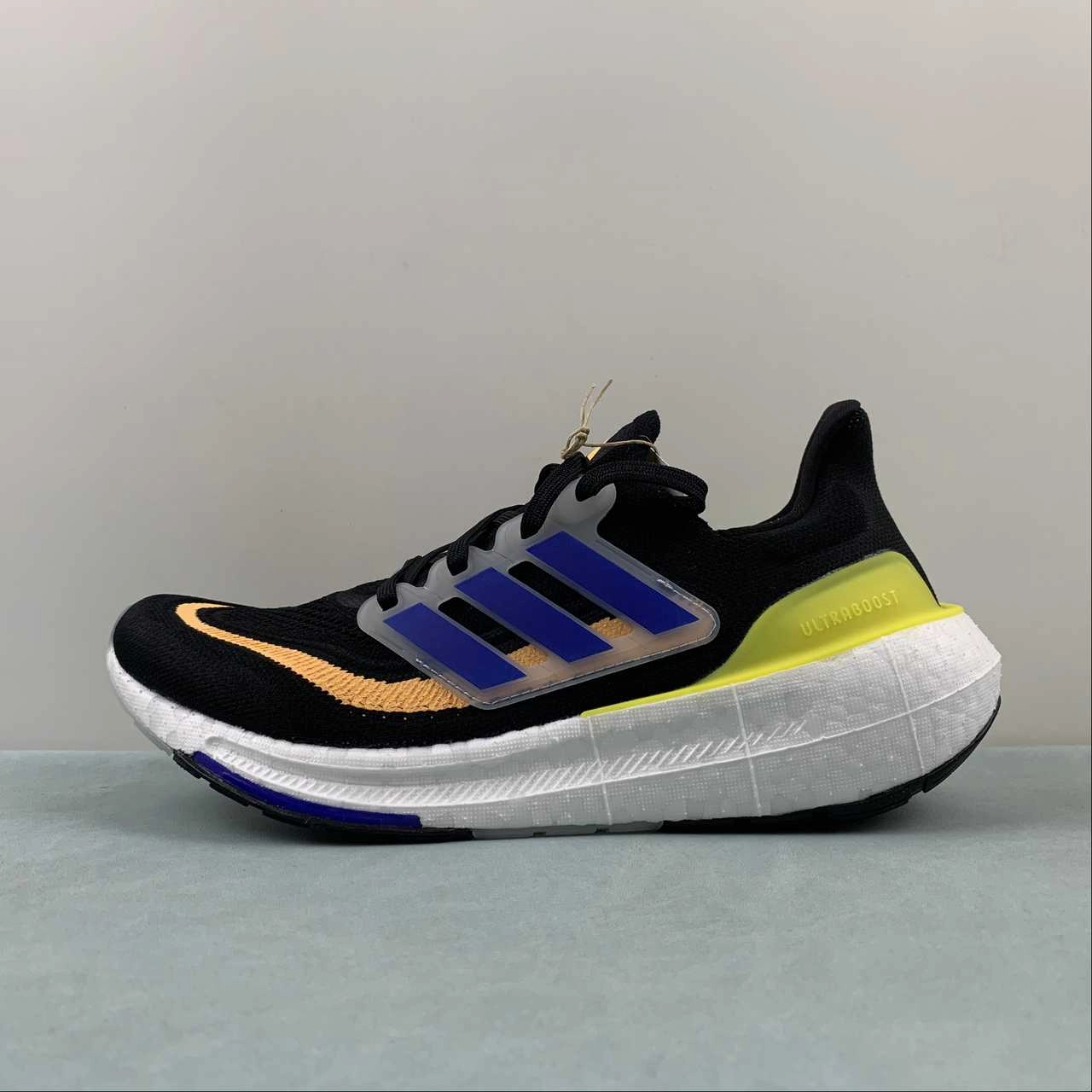 Amateur athlete check - design shoes Adidas UltraBoost Light Core Black Lucid Blue Bright Yellow HP9204