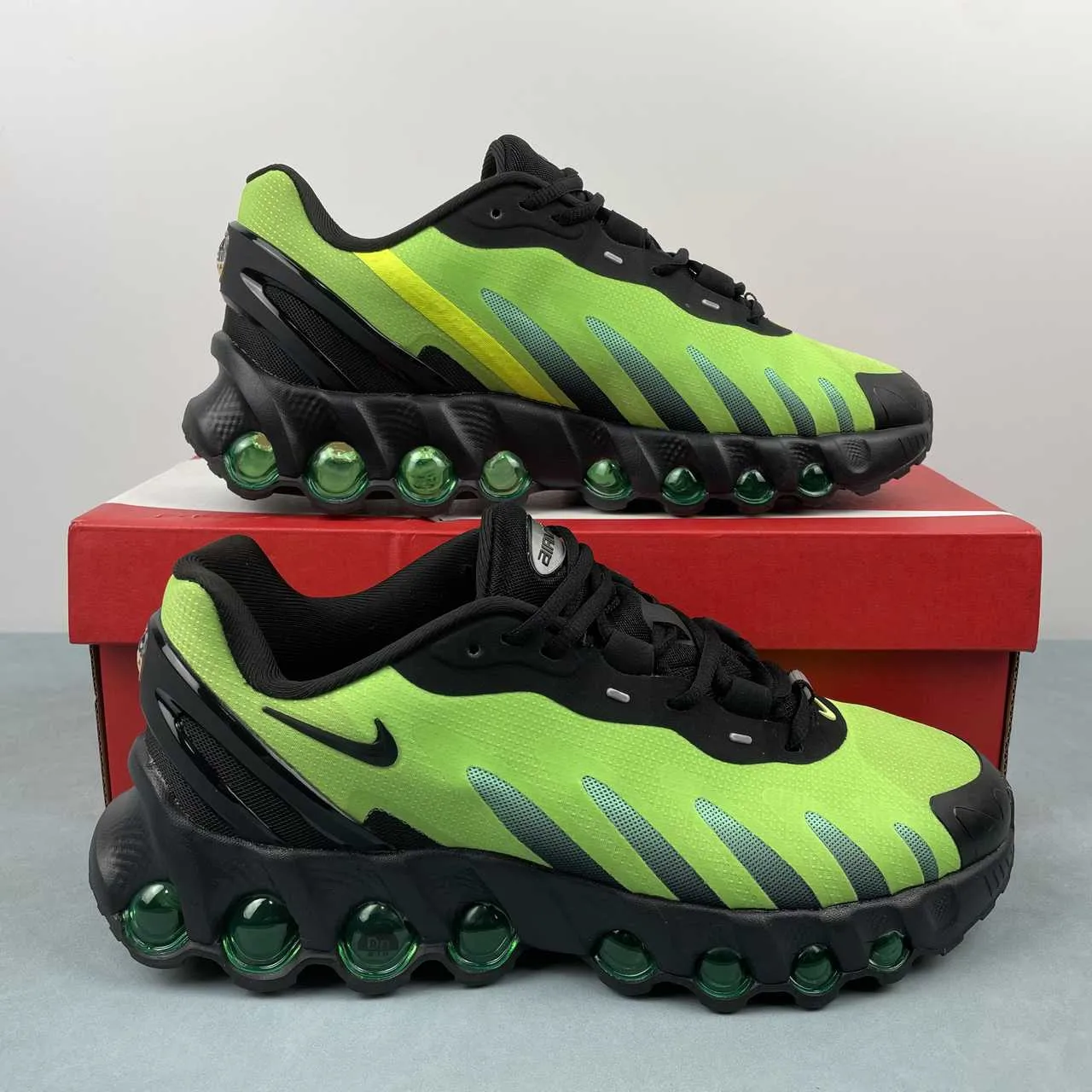 Air Max Dn8 Black Green FQ7860-007 compact backpack running in a chairlift area shoes