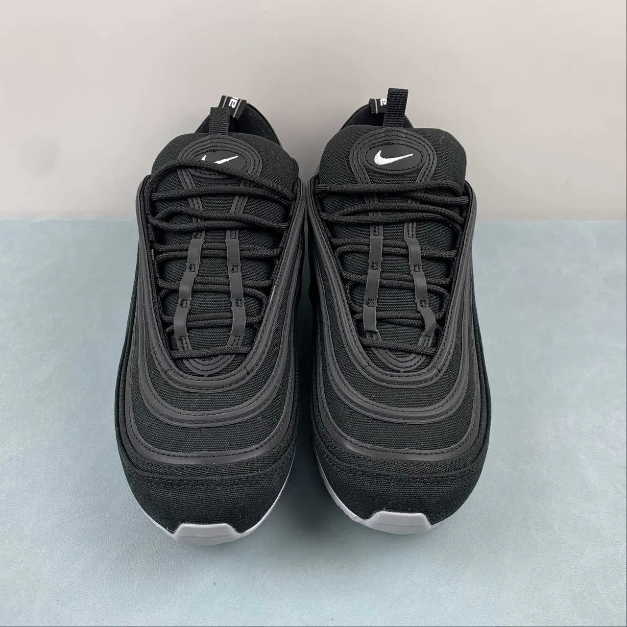 Air Max 97 Black White FZ0814-900 running in a community park shoes