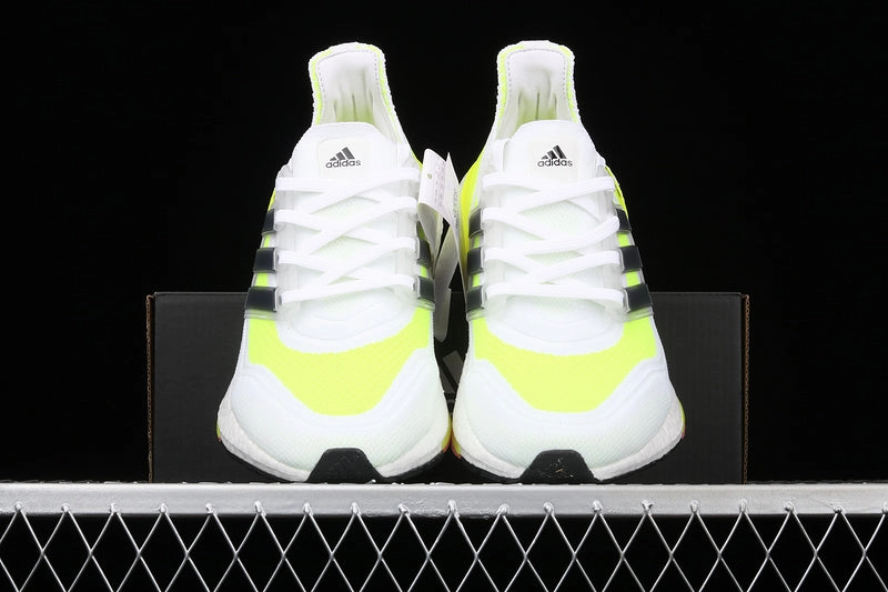 Retro-inspired silhouette Adidas UltraBoost 21 White Volt Black