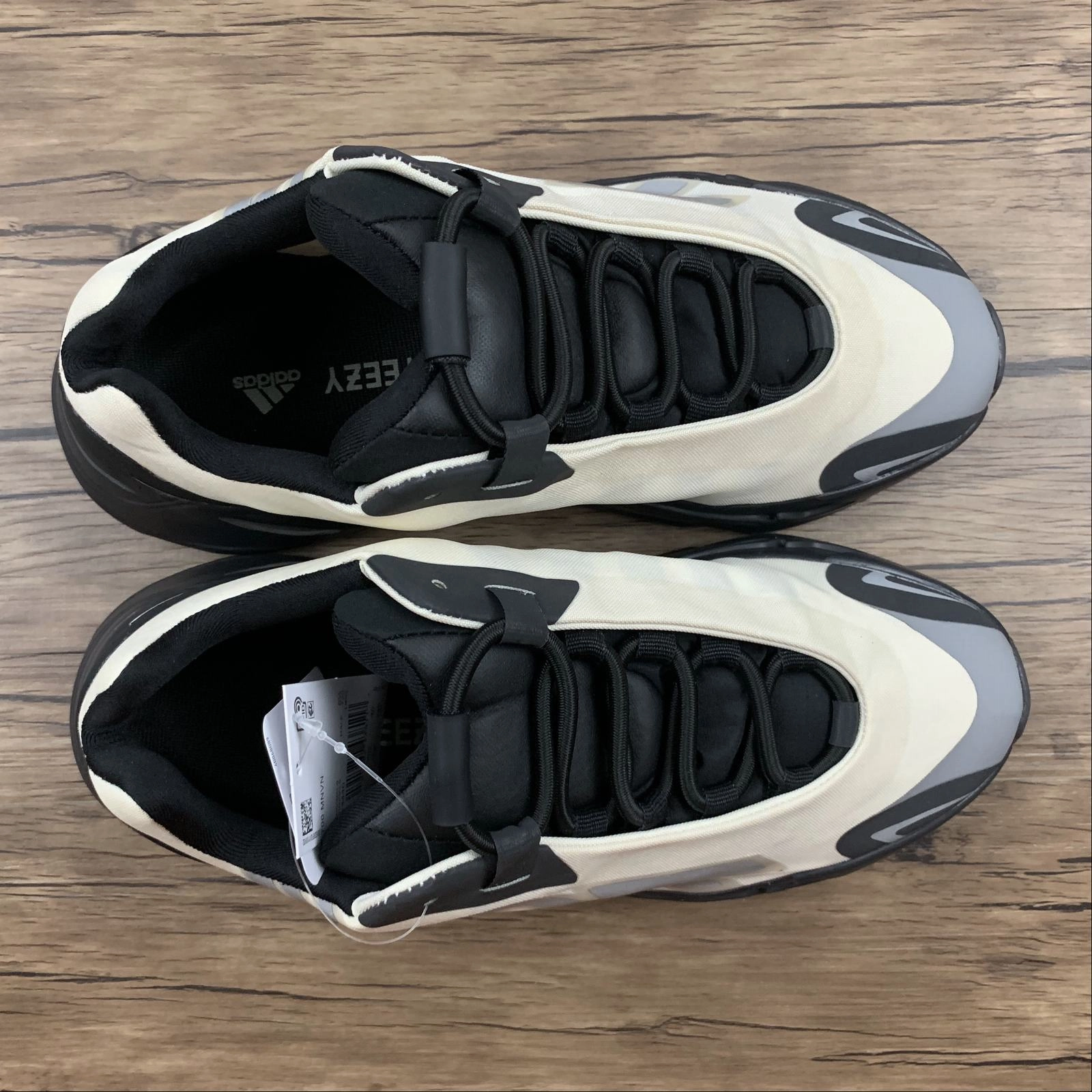running in a crater area shoes Adidas Yeezy Boost 700 MNVN Beige Black FY3729