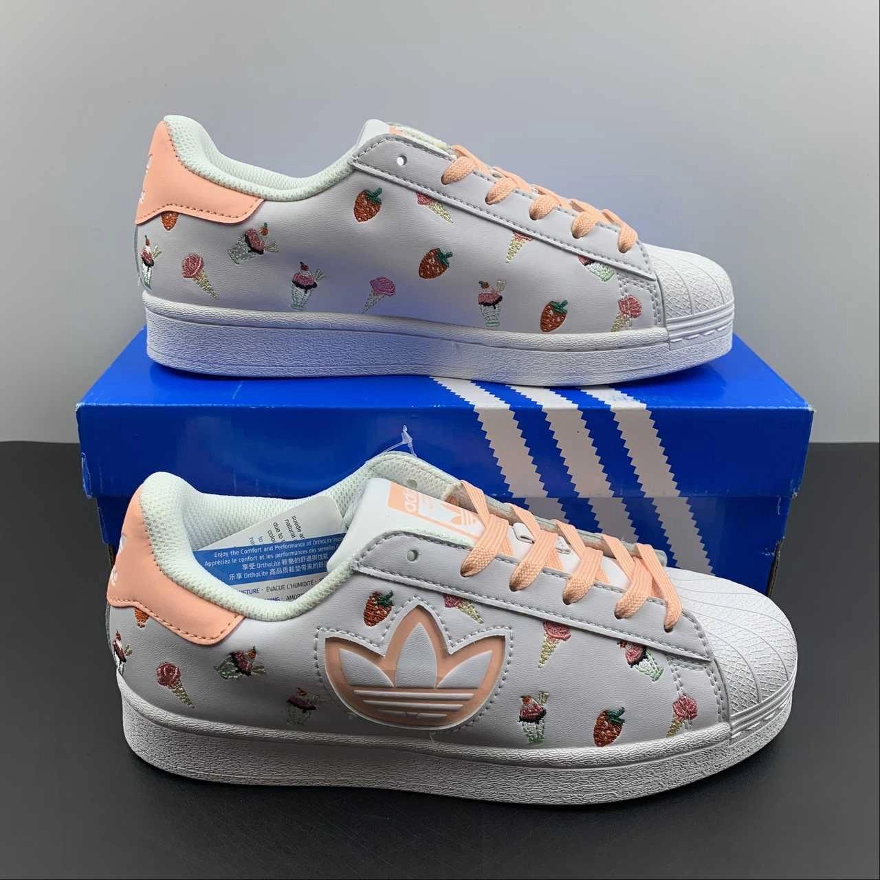 Adidas Superstar Cloud White Cloud White Ray Pink HO5667 running in a track meet shoes
