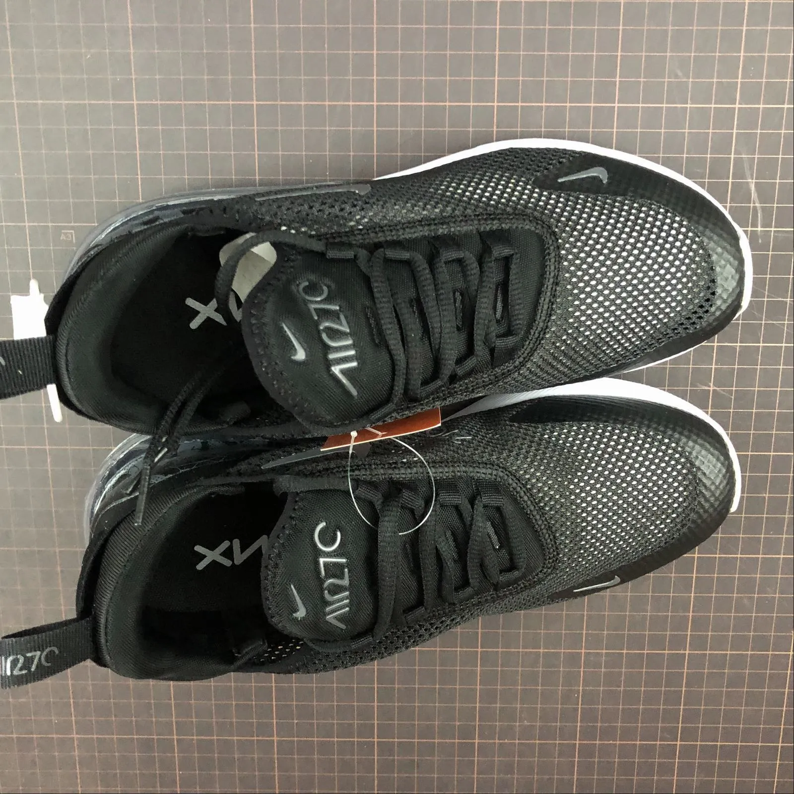 Air Max 270 Black Gray AR0499-105 running in a bridge area shoes