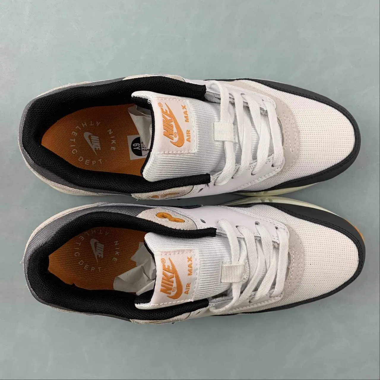 running in a group shoes running during a full moon Air Max 1 Athletic Deptment Black Forest Neutral Grey Varsity Maize FN7487-133