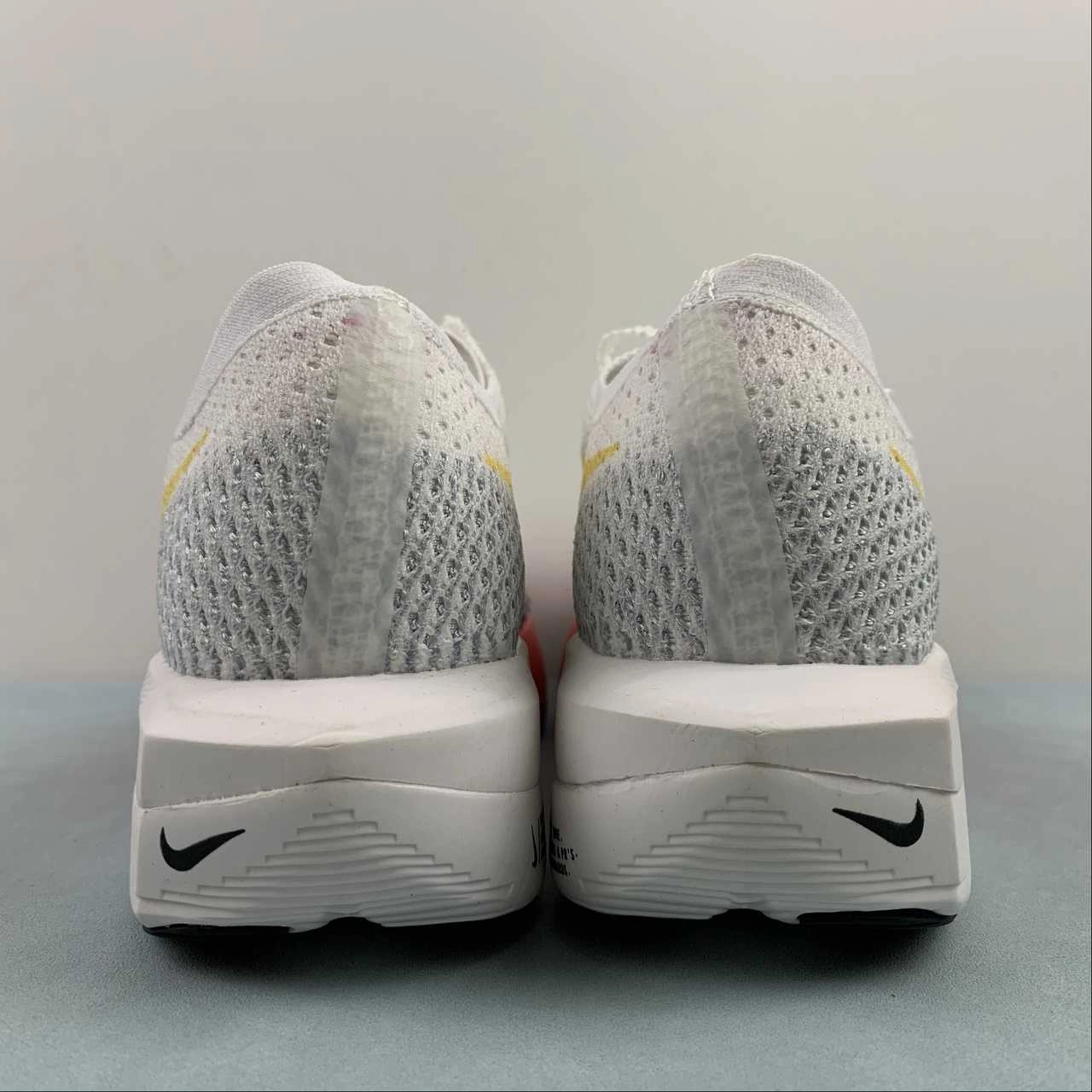 Air ZoomX Vaporfly Next 3 White Orange Red Yellow DX7957-118 Support layers integrate without restricting flexibility Lifting Training