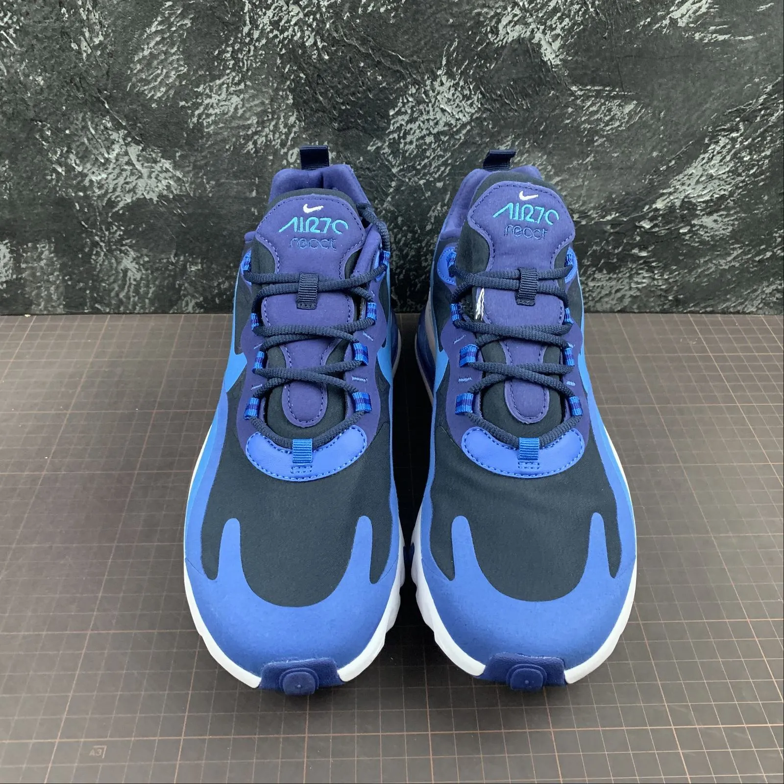 Air Max 270 React Blue Void Photo Blue AQ4971-400 running posture