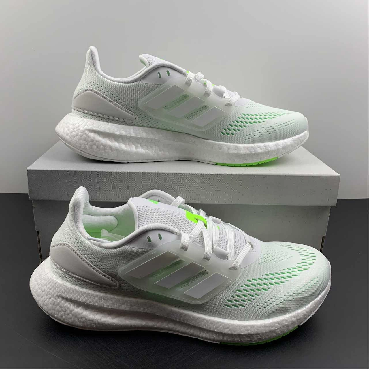 Adidas PureBoost 22 White Beam Green running in a cliff area shoes aerobic shoes