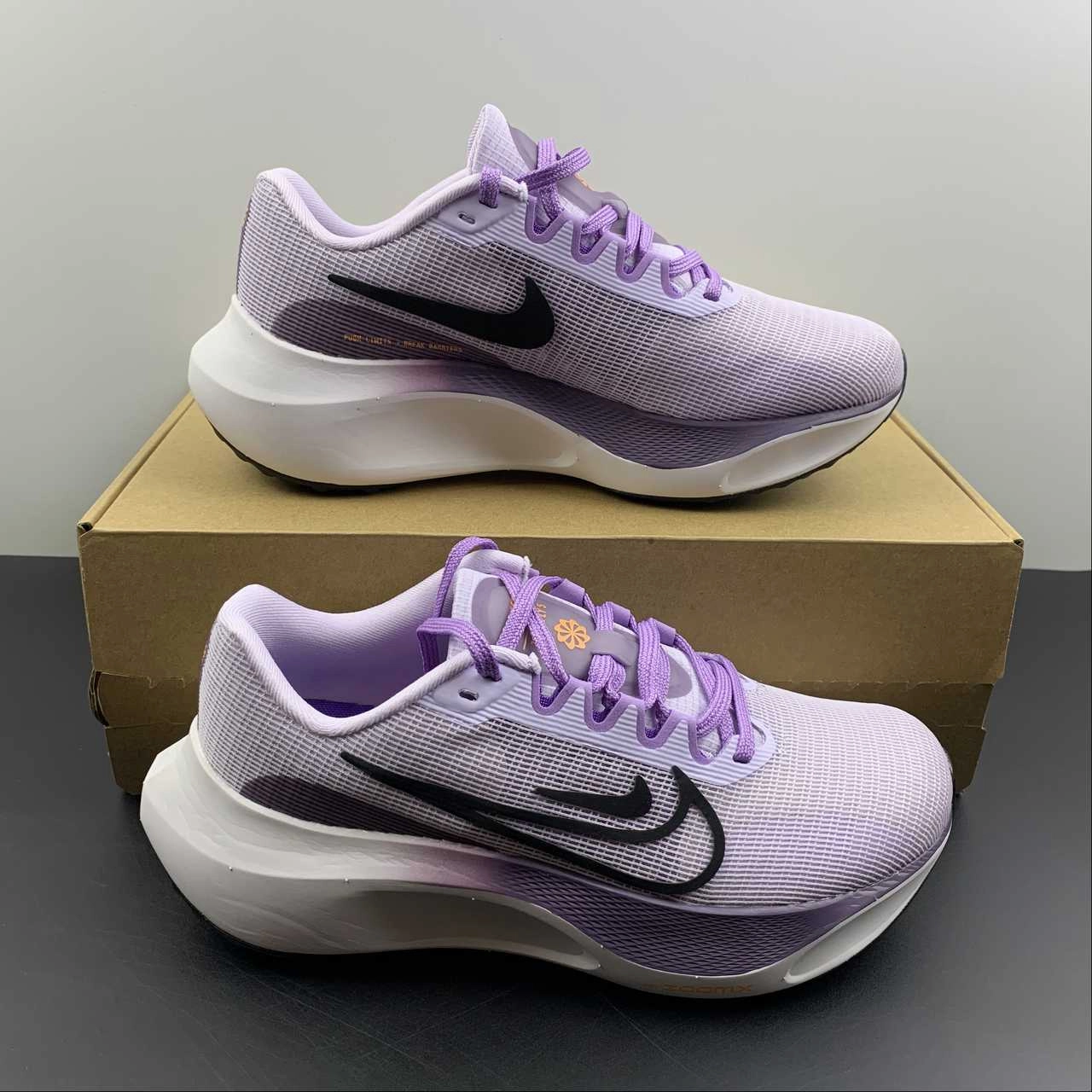 Outsole channels disperse force on impact zones Zoom Fly 5 Barely Grape Canyon Purple Lilac Black DM8974-500