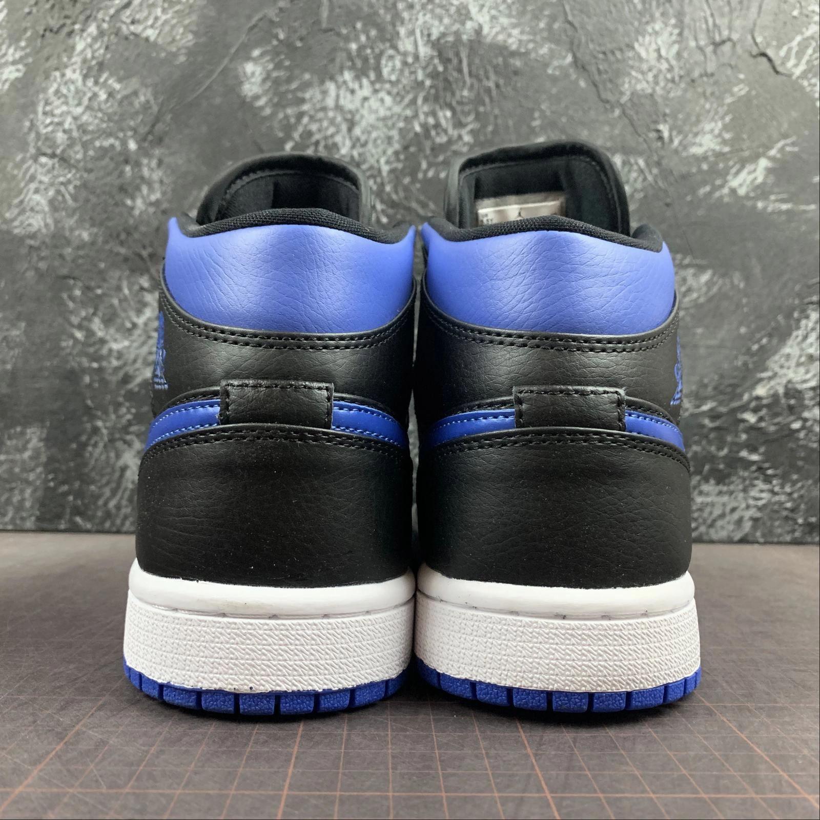 Air Jordan 1 Mid Black Blue White Reinforced Heel Guard Supportive Design