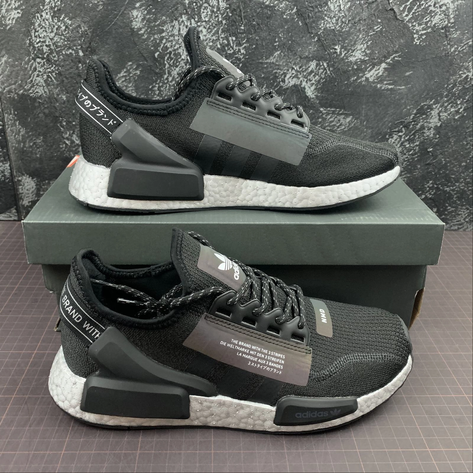 Solar - powered cruelty - free Adidas NMD R1 V2 Black and White