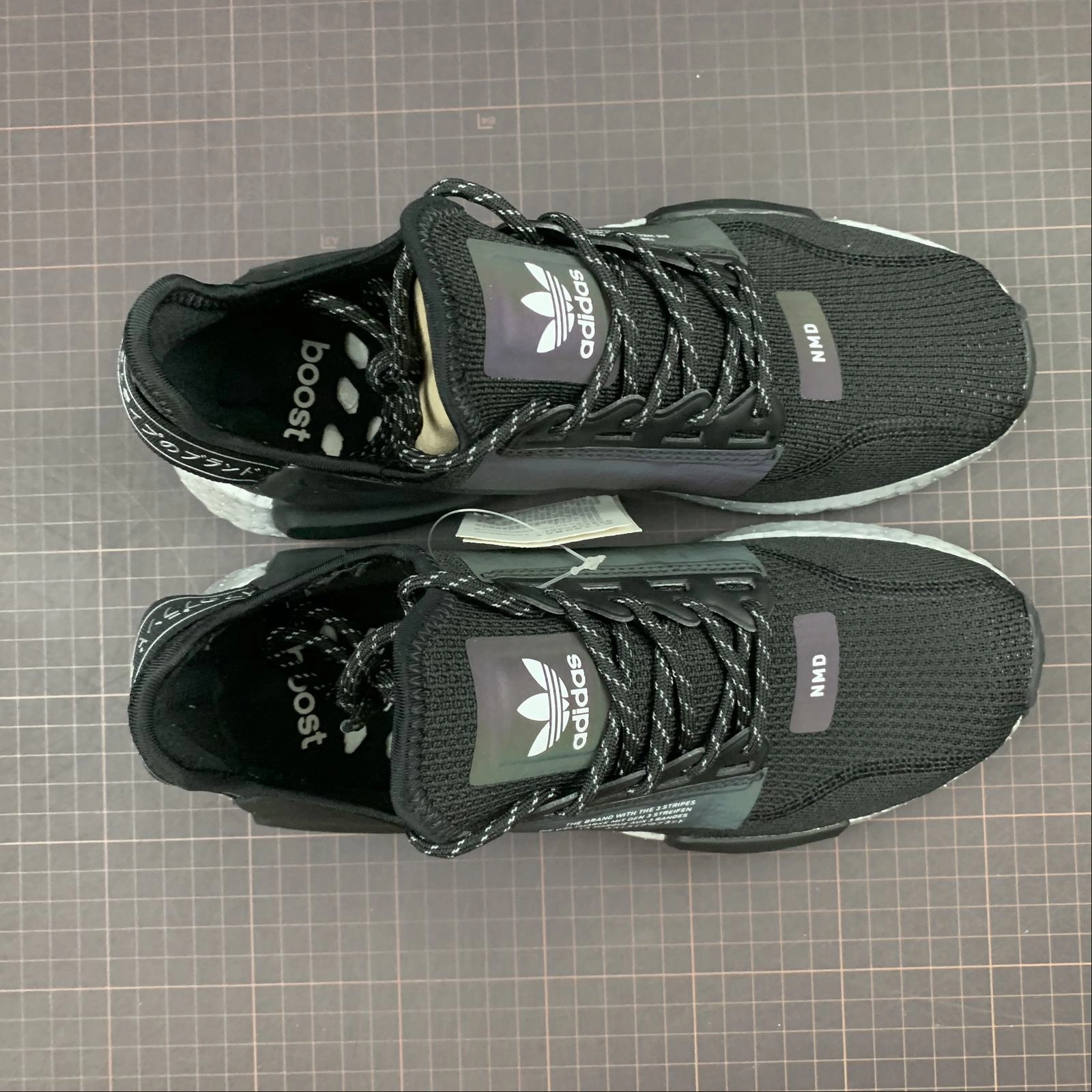 carbon - fiber - plate increased endurance Adidas NMD R1 V2 Black and White