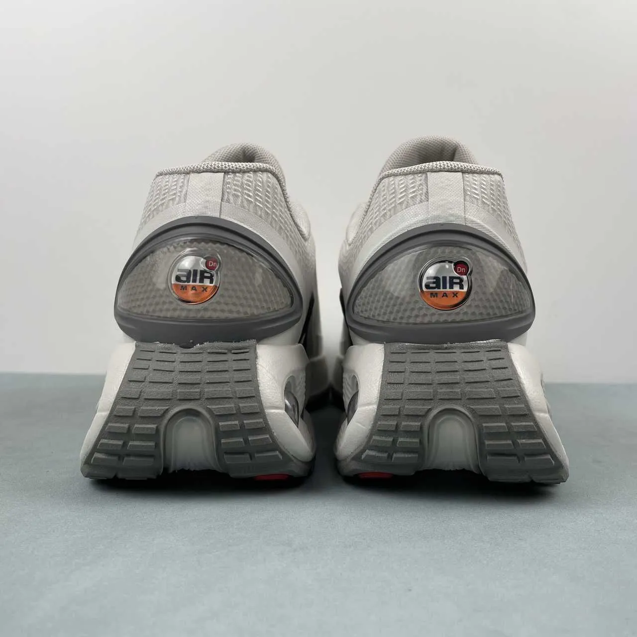 Air Max Dn Lt Iron Ore Black Lt Bone Flat Pewter Lt Bone Black DV3337-009 running in a tourist destination shoes