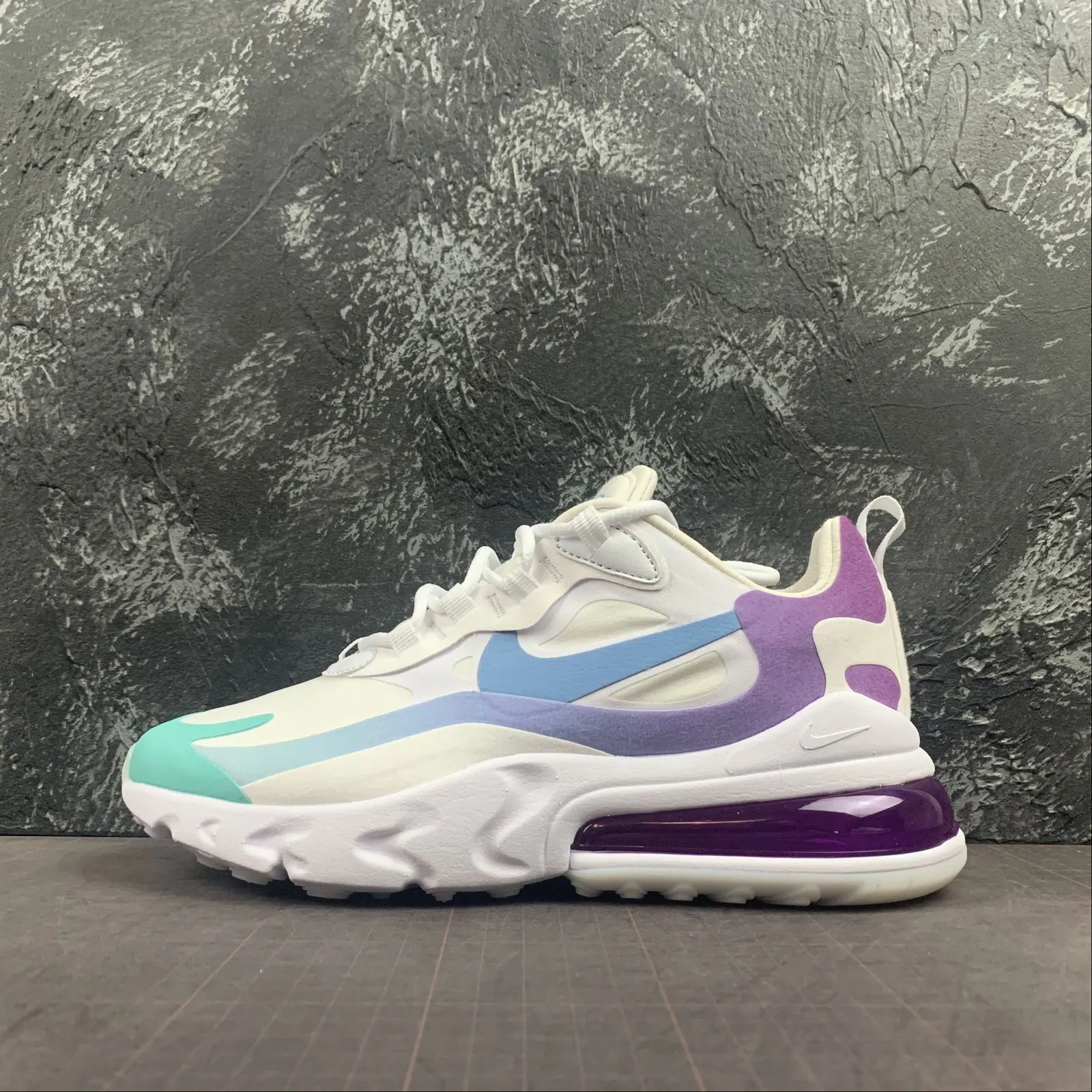 running in a marina area shoes Air Max 270 React Gradient Shift AT6174-102