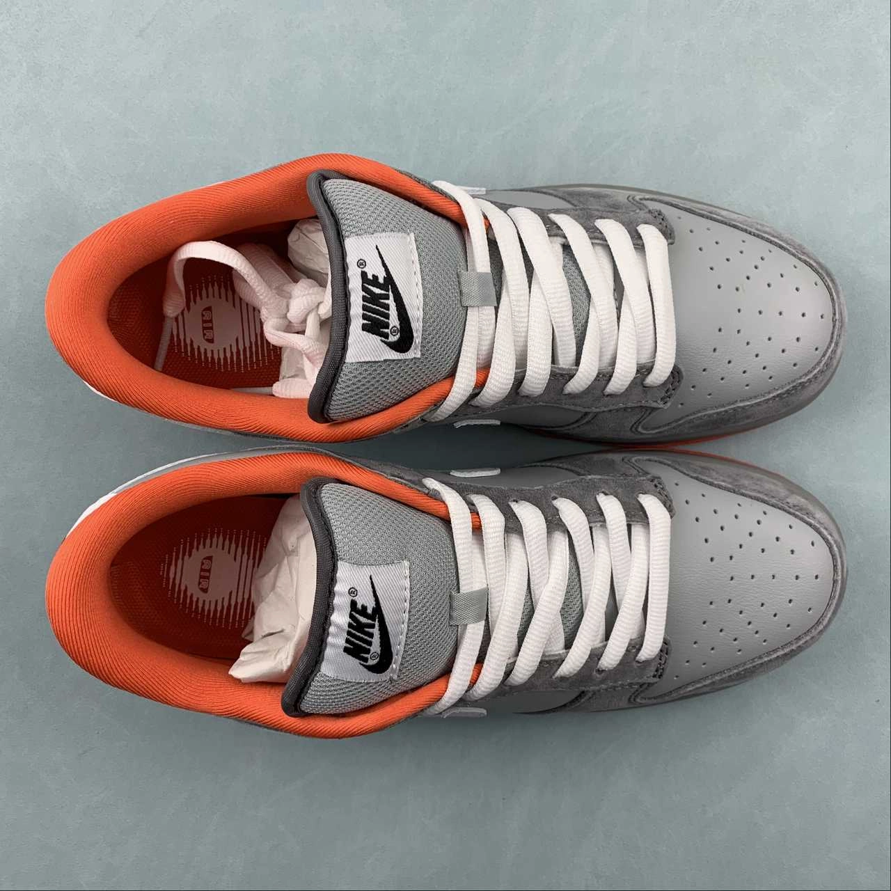 Flexible Motion Jeff Staple x Dunk SB Low Staple NYC Pigeon Medium Grey White Dark Grey 304292 011