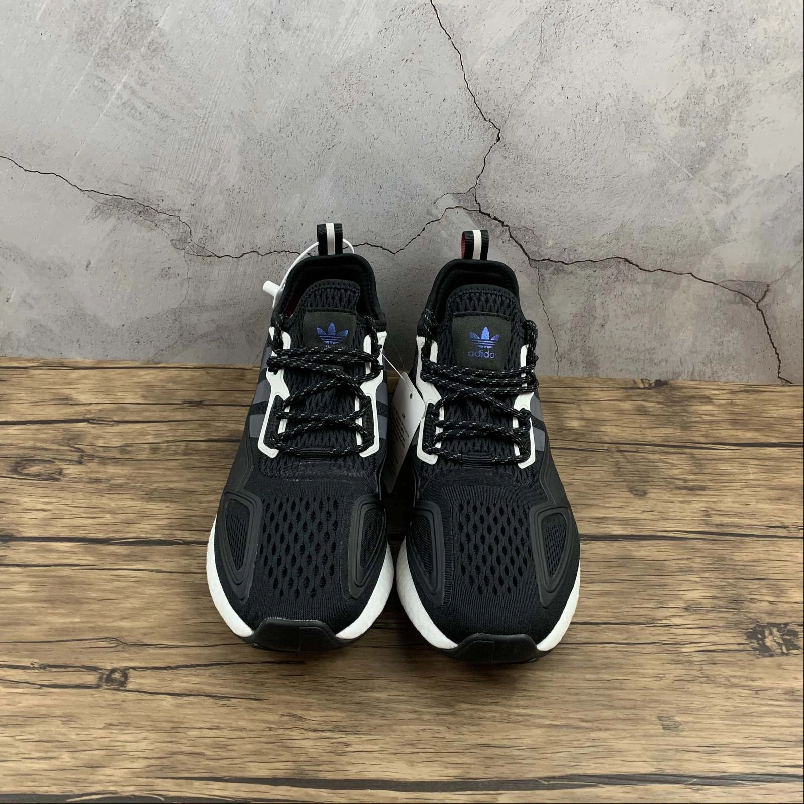 Adidas ZX 2K Boost Black Supplier Colour Shock Red FX7475 running in a swimming pool area shoes moisture - wicking running shoes
