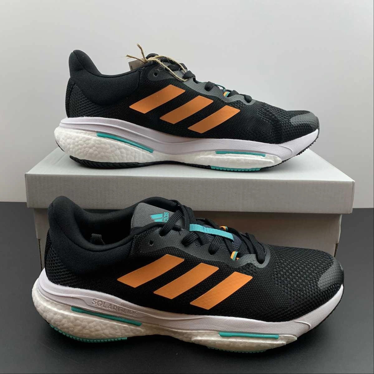marathon runner shoes Adidas Solar Glide 5 Black Orange GX5469