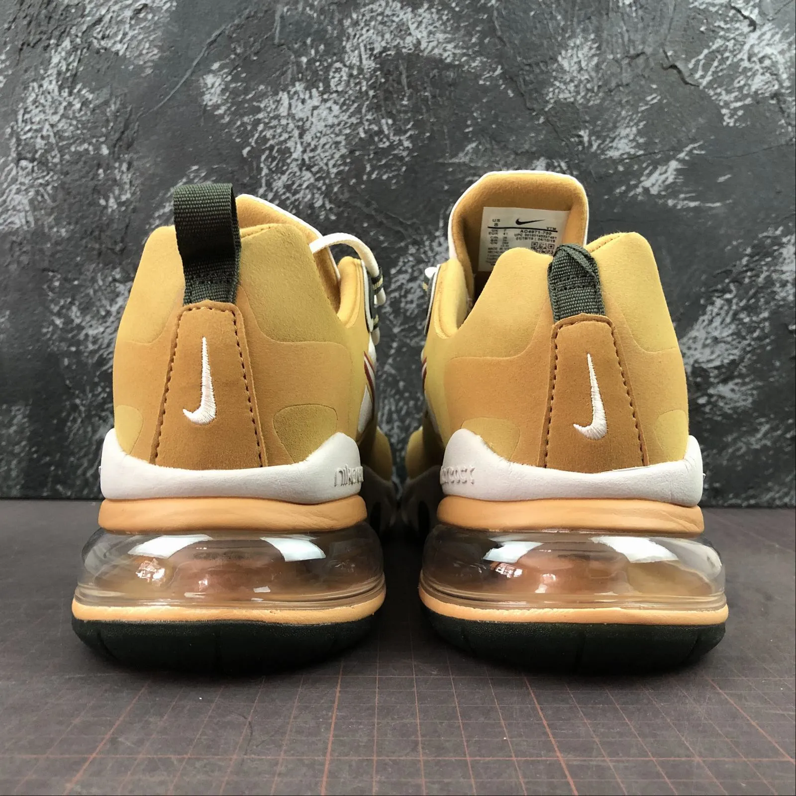 Air Max 270 React White Yellow Grey AO4971-700 running in a fitness center shoes