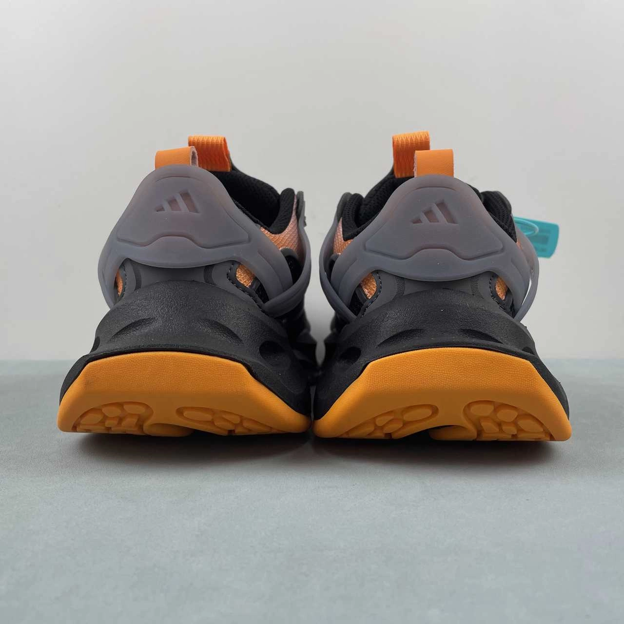 Adidas XLG Runner Deluxe Core Black Pink Orange Grey JP5765 running in a mud pot area shoes Curvy Running