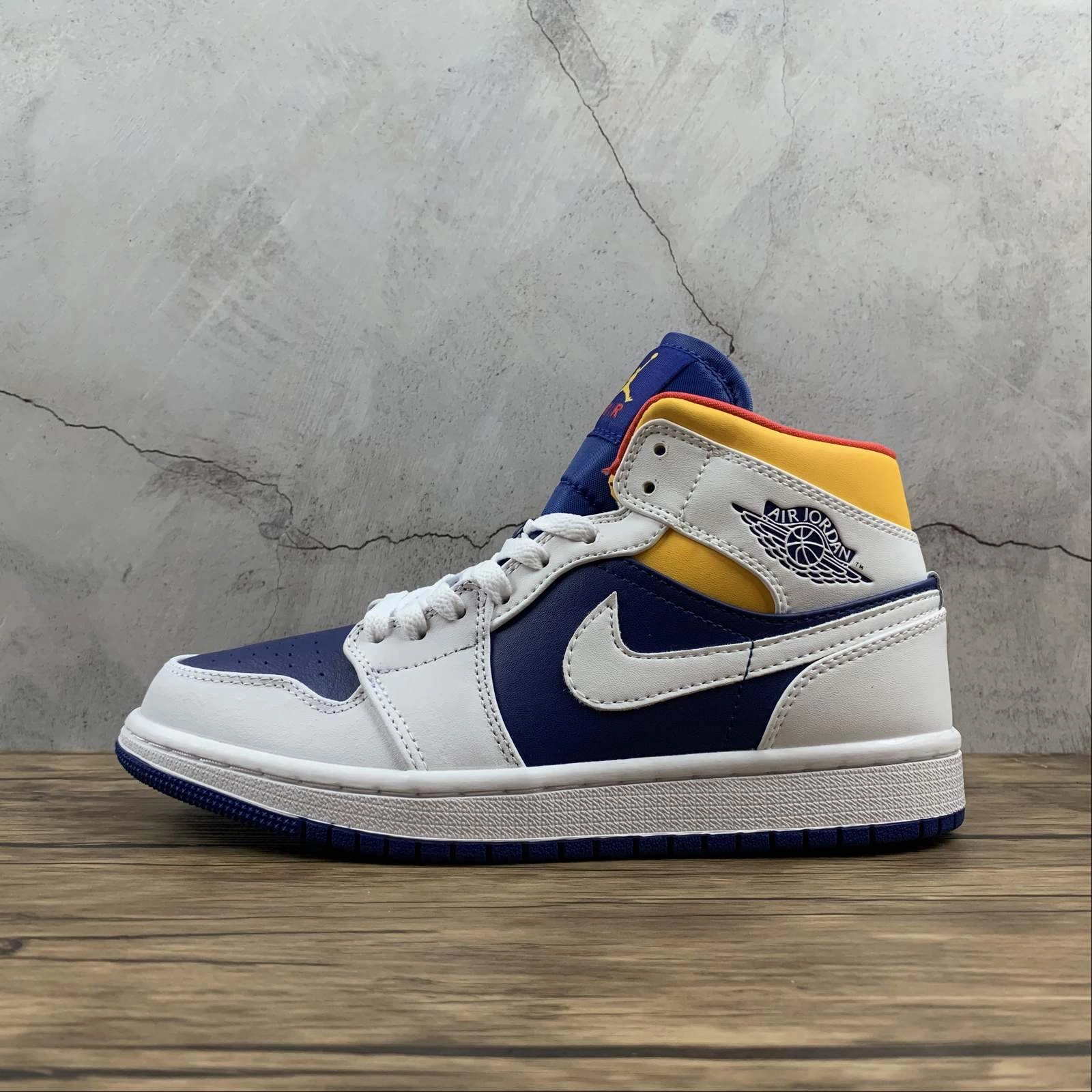 Air Jordan 1 Mid Blue White Yellow Reinforced Eyelets Design