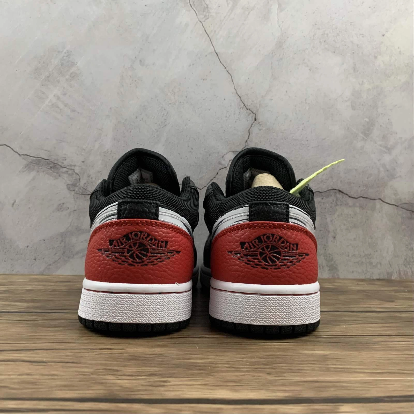 Air Jordan 1 Low SE Black Red Brushstroke Swoosh DA4659-001 Moisture Management Precision Edge Design