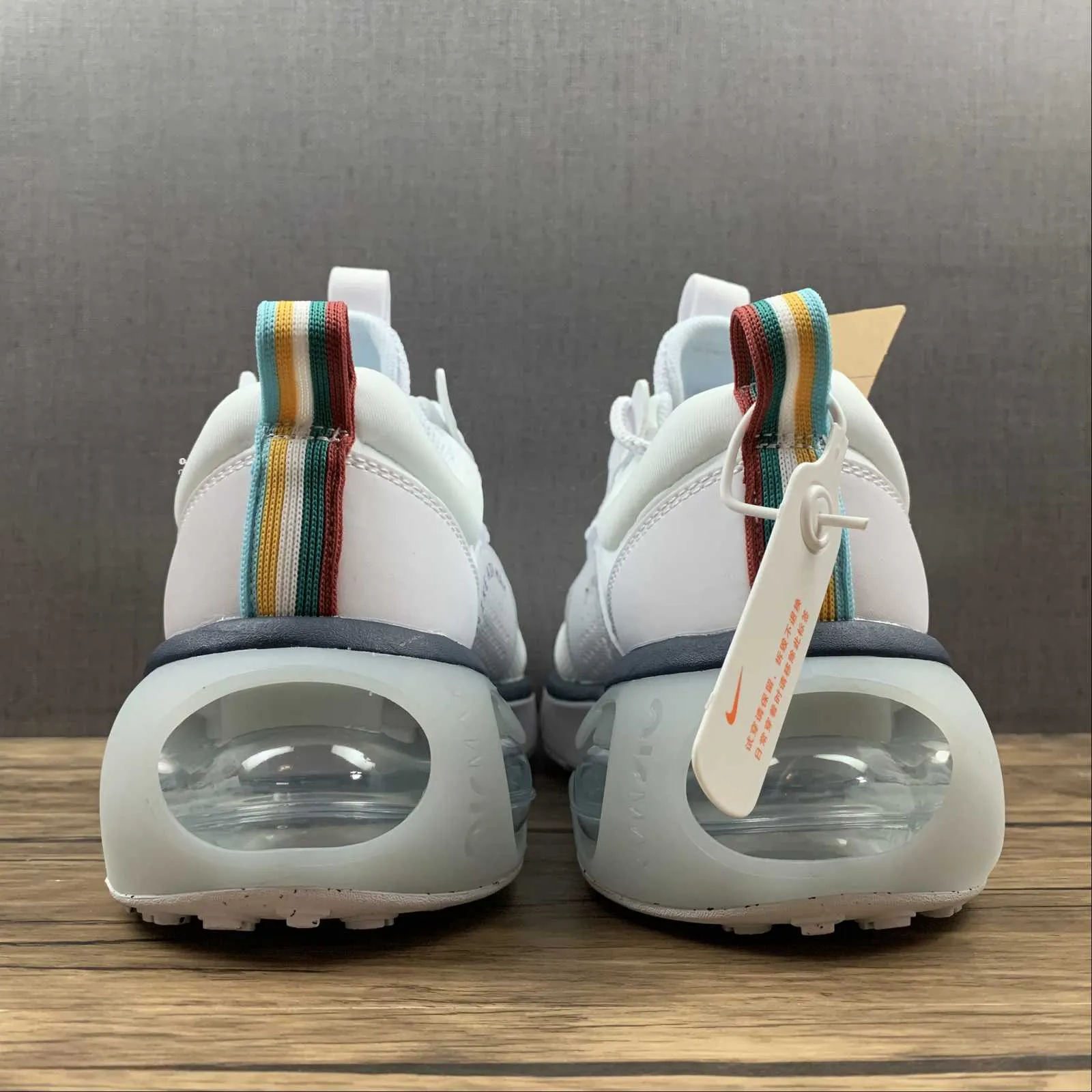 Air Max 2021 White Navy Red DC9478-100 running on soft surface