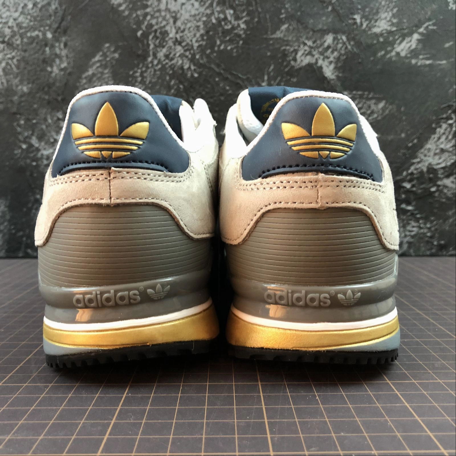 Adidas ZX750 Grey Gold Q35066 running with sunglasses