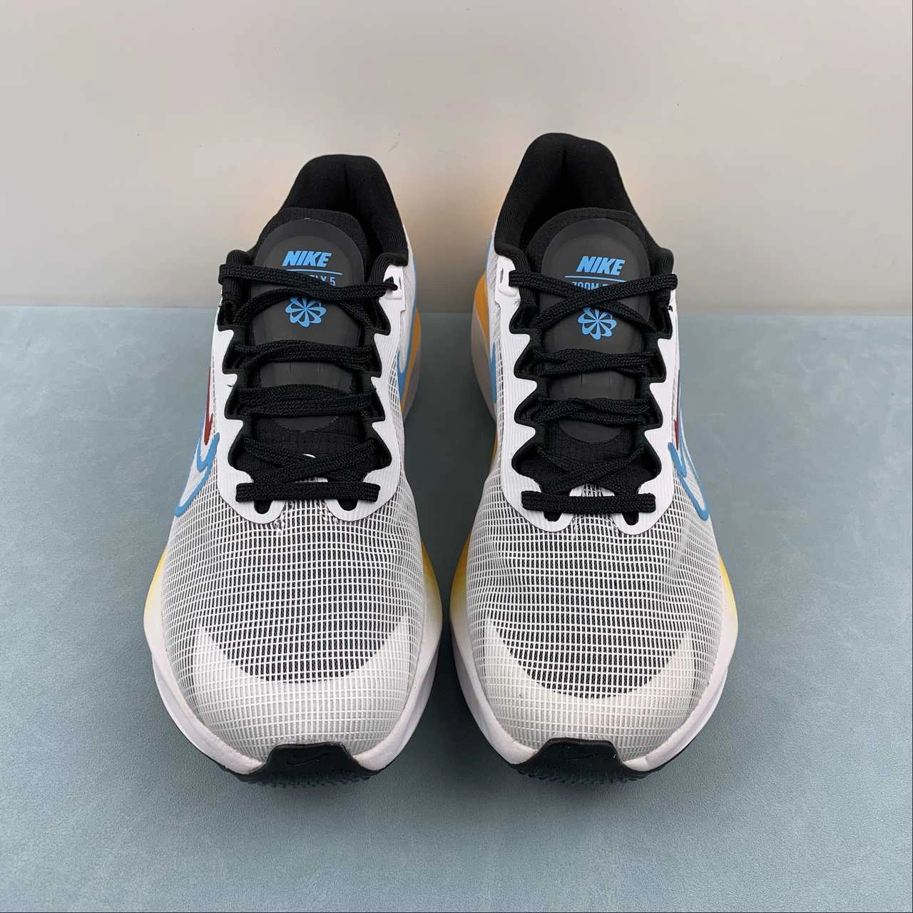 Zoom Fly 5 Black White Spicy Red Baltic Blue DM8974-002 Power Motion Outsole traction pattern supports agile footwork