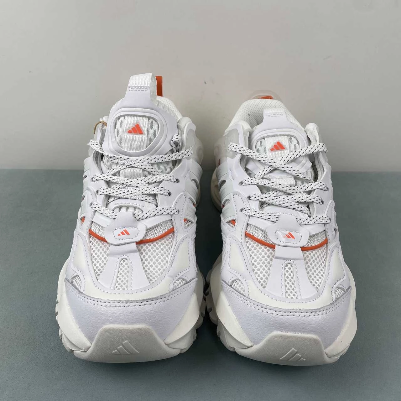 Adidas XLG Runner Deluxe Cloud White Grey Orange JP5758 running with a running belt